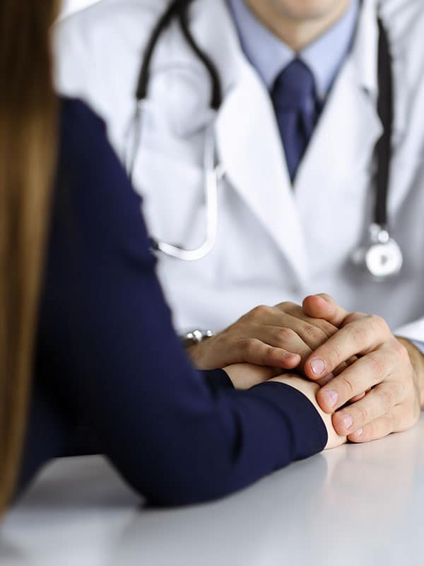 dr-reassuring-patient-600x800px doctor reassuring patient